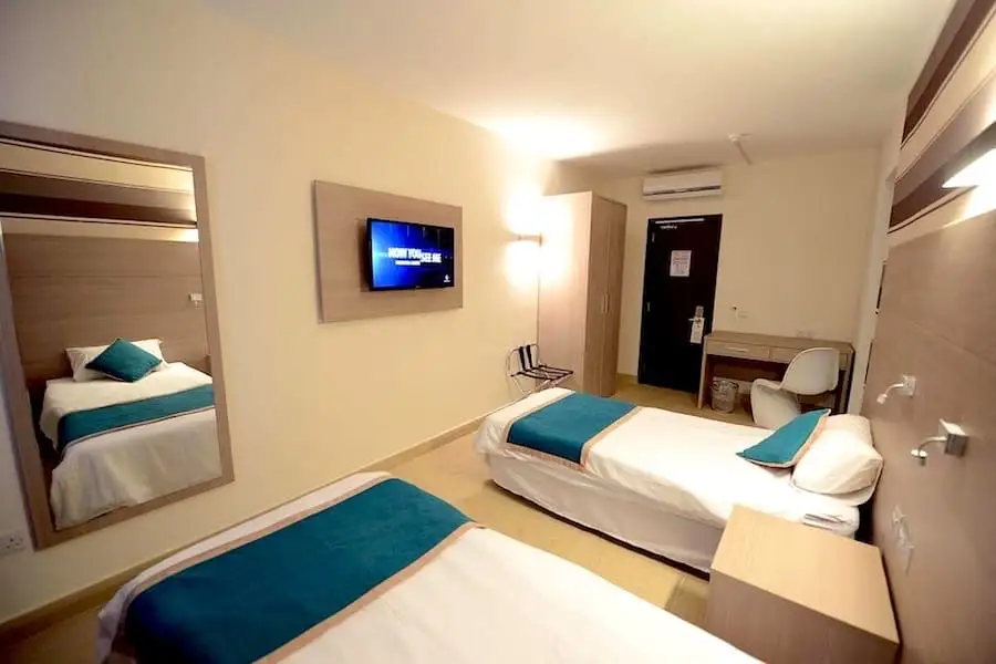 Room with two single beds at Day's Inn Malta