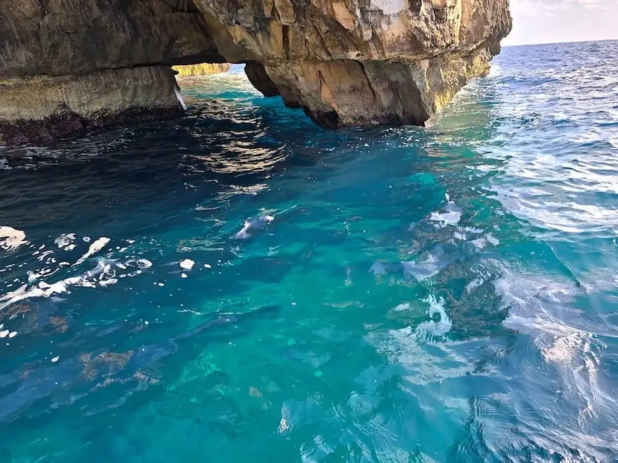 Waters beneath the Blue Grotto caves